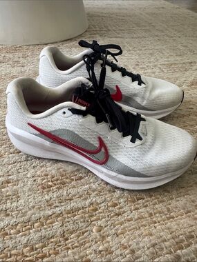 Nike White Sneakers with Red Swoosh and Black Laces
